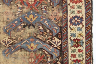 antique little east caucasian rug, probably best described as seichour, with an unusual variation of the bijov design. The light blue wing like medallions are hard to ignore. "as found", very dirty  ...