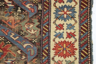 antique little east caucasian rug, probably best described as seichour, with an unusual variation of the bijov design. The light blue wing like medallions are hard to ignore. "as found", very dirty  ...