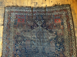 Back room storage clean out. Old South Persian rug. Dirty, worn, damaged. Priced accordingly. App 4'6" x 8'               