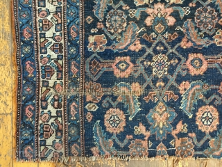 Back room storage cleanout. Old bidjar rug fragment. Dirty with wear. About 3' x 5'                  