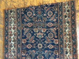 Back room storage cleanout. Old bidjar rug fragment. Dirty with wear. About 3' x 5'                  