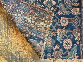 Back room storage cleanout. Old bidjar rug fragment. Dirty with wear. About 3' x 5'                  