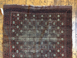 Back room storage clean out. Old Baluch rug. Dirty, worn and damaged. about 2'6" x 4'6"                 