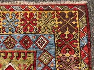 Antique Turkish village prayer rug. Simple, dramatic drawing. Good saturated natural colors including a rich tomato red, strong yellow, sky blues, lovely greens and a nice old aubergine. Overall low pile with  ...