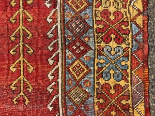 Antique Turkish village prayer rug. Simple, dramatic drawing. Good saturated natural colors including a rich tomato red, strong yellow, sky blues, lovely greens and a nice old aubergine. Overall low pile with  ...