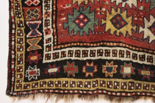 antique large kordi or quchan kurd rug with a strangely assymetric design. In good allover condition with much thick pile. All natural colors featuring a nice old green. A few small repairs,  ...