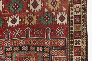 antique large kordi or quchan kurd rug with a strangely assymetric design. In good allover condition with much thick pile. All natural colors featuring a nice old green. A few small repairs,  ...