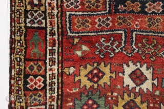 antique large kordi or quchan kurd rug with a strangely assymetric design. In good allover condition with much thick pile. All natural colors featuring a nice old green. A few small repairs,  ...