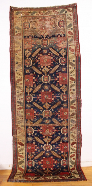 Early NW Persian kurdish rug. Interesting and fresh example of an iconic design. "as found", with areas of wear, scattered old small crude repairs. Some lustrous pile some low pile and oxidation.  ...