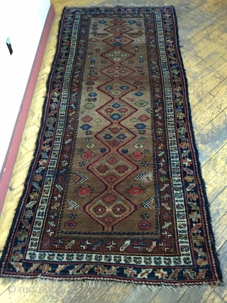 Antique kurdish long rug in good condition with charming little people and animals. Beautiful camel ground and all natural colors. Good thick overall pile and nice tight weave. I don't see any  ...