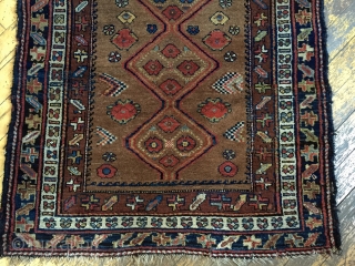 Antique kurdish long rug in good condition with charming little people and animals. Beautiful camel ground and all natural colors. Good thick overall pile and nice tight weave. I don't see any  ...