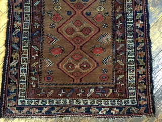 Antique kurdish long rug in good condition with charming little people and animals. Beautiful camel ground and all natural colors. Good thick overall pile and nice tight weave. I don't see any  ...