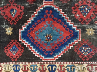 Business mans special. Antique Caucasian rug of some kind featuring a man wearing a tie. Kazak? Karrabaugh? Zakatala? Bold and compelling design with an unusual palette. Vibrant blues and reds along with  ...