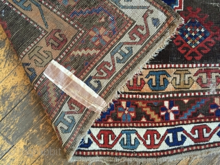 Business mans special. Antique Caucasian rug of some kind featuring a man wearing a tie. Kazak? Karrabaugh? Zakatala? Bold and compelling design with an unusual palette. Vibrant blues and reds along with  ...