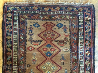 Antique kurdish long rug in good condition with charming little people and animals. Beautiful camel ground and all natural colors. Good thick overall pile and nice tight weave. I don't see any  ...