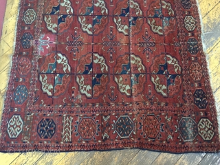 Antique Tekke main carpet fragment. As found with wear, stains, patches, reduced size. All natural colors. Storage clean out and priced accordingly. Good age, ca. 1870 or earlier. 3'8" x 6'7"  