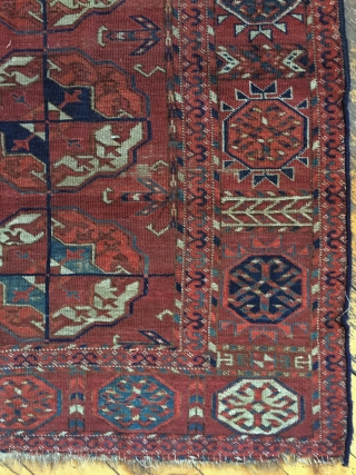 Antique Tekke main carpet fragment. As found with wear, stains, patches, reduced size. All natural colors. Storage clean out and priced accordingly. Good age, ca. 1870 or earlier. 3'8" x 6'7"  