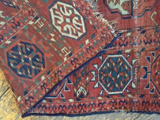 Antique Tekke main carpet fragment. As found with wear, stains, patches, reduced size. All natural colors. Storage clean out and priced accordingly. Good age, ca. 1870 or earlier. 3'8" x 6'7"  