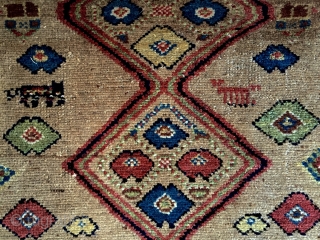 Antique kurdish long rug in good condition with charming little people and animals. Beautiful camel ground and all natural colors. Good thick overall pile and nice tight weave. I don't see any  ...