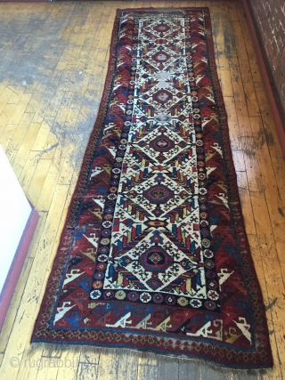 Antique northwest Persian rug. Brilliant natural colors. Mostly thick full pile with small areas of damage as shown. As found, needing a good wash. Needs repiling of old moth damage exposing foundation.  ...