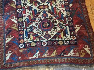 Antique northwest Persian rug. Brilliant natural colors. Mostly thick full pile with small areas of damage as shown. As found, needing a good wash. Needs repiling of old moth damage exposing foundation.  ...