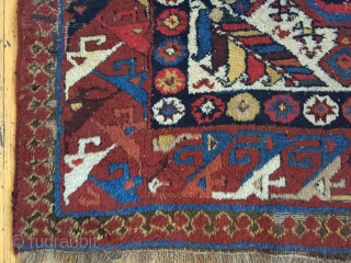 Antique northwest Persian rug. Brilliant natural colors. Mostly thick full pile with small areas of damage as shown. As found, needing a good wash. Needs repiling of old moth damage exposing foundation.  ...