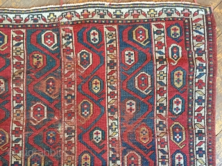 Antique kazak rug with an interesting striped design. Wear, damage and crude old repairs. Original colors all good. Rough but priced accordingly. Storage clean out continues. Late 19th c. 3'11" x 7'6" 