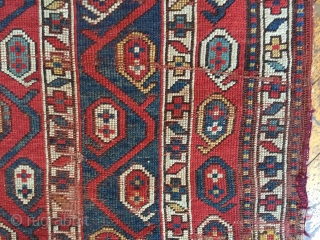 Antique kazak rug with an interesting striped design. Wear, damage and crude old repairs. Original colors all good. Rough but priced accordingly. Storage clean out continues. Late 19th c. 3'11" x 7'6" 