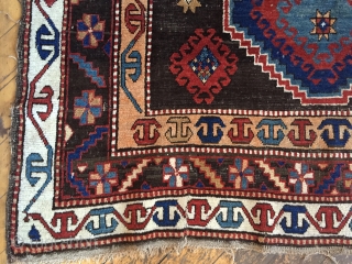 Business mans special. Antique Caucasian rug of some kind featuring a man wearing a tie. Kazak? Karrabaugh? Zakatala? Bold and compelling design with an unusual palette. Vibrant blues and reds along with  ...