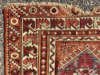 Antique little west Anatolian prayer rug. Interesting little rug found locally. I like the archaic serrated leaf border. Bergama? Coarse weave and overall low pile with  scattered wear and a good  ...