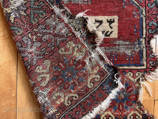 Early Anatolian prayer rug fragment with an unusual inscribed panel. Dated? Great color. Condition as shown. Needs mounting. Great project.  
Early 19th c. 2’7” x 5’ 6”     