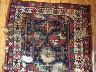 Antique tribal long rug, probably veramin, with terrific drawing featuring an attractive archaic border. All natural colors. Washed and clean. Otherwise as found with scattered heavy wear through out as shown. Storage  ...