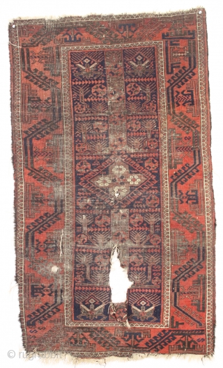 antique small baluch rug with interesting design features. Another piece from a local Boston home. In very rough condition but with some powerful archaic elements. Wear and damage clearly shown. Priced accordingly.  ...