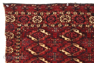 Antique tekke chuval with superb wool and beautiful all natural colors. Crisp drawing with a very elegant skirt panel. A fine weaving with a red ground that almost glows along with clear  ...