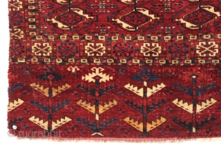Antique tekke chuval with superb wool and beautiful all natural colors. Crisp drawing with a very elegant skirt panel. A fine weaving with a red ground that almost glows along with clear  ...