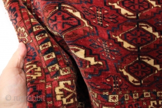 Antique tekke chuval with superb wool and beautiful all natural colors. Crisp drawing with a very elegant skirt panel. A fine weaving with a red ground that almost glows along with clear  ...