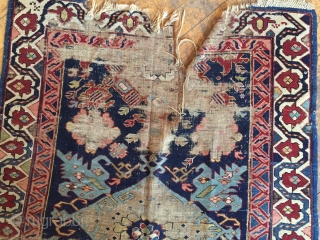 Antique seichour kuba long rug with an eye catching border. As found, Worn and damaged as shown. Nice light blues. Storage clean out priced. Ca. 1880. 3'6" x 9'2"    