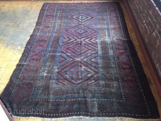 Antique mushwani Baluch main carpet. Older example with all natural colors. As found with heavy wear and brown oxidation. Storage clean out priced. 19th c. 5'9" x 8'9"     