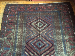 Antique mushwani Baluch main carpet. Older example with all natural colors. As found with heavy wear and brown oxidation. Storage clean out priced. 19th c. 5'9" x 8'9"     