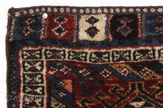 antique persian bagface, possibly baktiari. Charming little weaving featuring pile closure tabs. Full thick pile. All natural colors including a nice old purple. Reasonably clean. Good age, ca 1880. 20" x 21" 