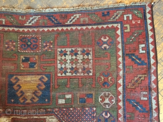 Antique karachopf kazak rug. As found, dirty with heavy wear and old poor repairs. More or less Intact old survivor. Storage clean out nearing the end. 19th c. 5'3" x 7' 1" 