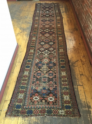 Antique runner, good quality, maybe kurdish or luri. Interesting snowflake design. Lots of natural brown wools. As found with some wear and brown oxidation. Good natural colors. Nice purples. Reasonably clean. Restorable  ...