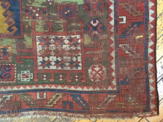 Antique karachopf kazak rug. As found, dirty with heavy wear and old poor repairs. More or less Intact old survivor. Storage clean out nearing the end. 19th c. 5'3" x 7' 1" 