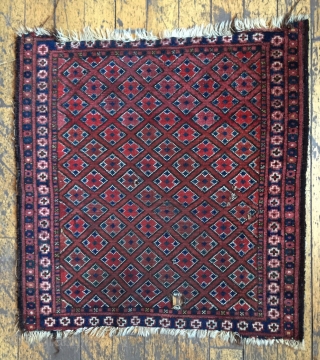 Antique little Ersari rug with an interesting diamond lattice design. Very dirty by Looks like all natural colors to me. As found, edge damage and a few little holes. Thin old glue  ...