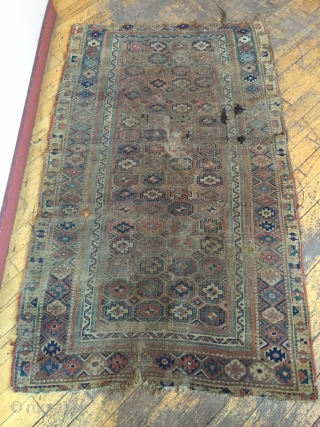 Antique kurd bidjar rug. As found, very dirty with heavy wear, old moth and scattered damage as shown. Storage clean out nearly done. 19th c. 3'10" x 6'4"     