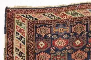 antique seichour kuba rug. Active and interesting field design. Fresh New England rug. All natural colors. As found, very very dirty with some wear, very small hole as shown. Original selvages. Couple  ...