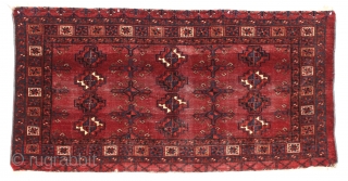 Antique large ersari chuval with spacious drawing and an eye catching border. A grand old chuval with an unusual corrosive red ground and brilliant light blues. All natural colors with multiple reds.  ...