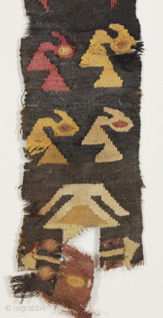 pre columbian textile. Looks South American to me but not my area of expertise. "as found", not mounted. Found locally. (in the piles). 3" x 26"       