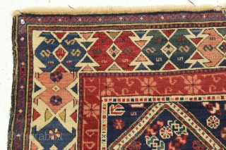 Antique seichour kuba rug with an interesting border. Near original condition with overall good thick pile and excellent tight weave. All natural colors including a beautiful old pink. Ends a bit unraveled  ...