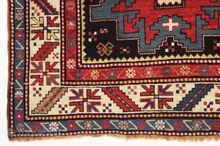 antique kazak rug in excellent condition with inscribed date 1305 (1887). Bold lesghi star design with charming animals and what looks to be a full blown fireworks display. All natural colors featuring  ...